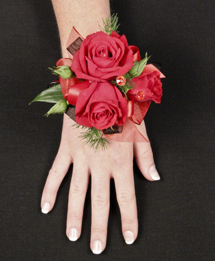 PUTTING ON THE RITZ RED PROM CORSAGE (In-Store Purchase Only. Not available for online ordering or shipping. Please contact the store 9052780000)