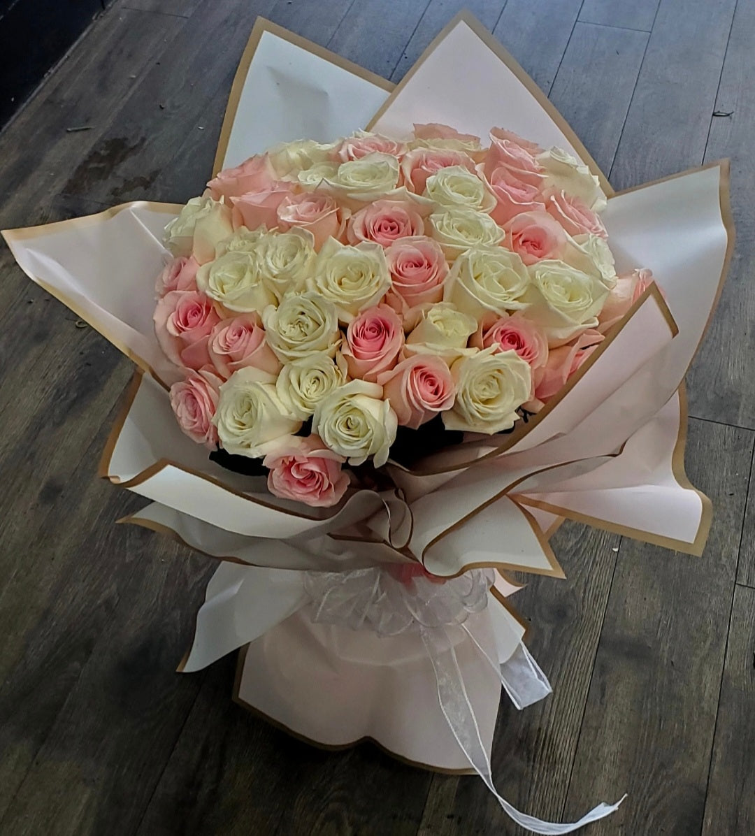 50 white and pink roses hand-tied bouquet