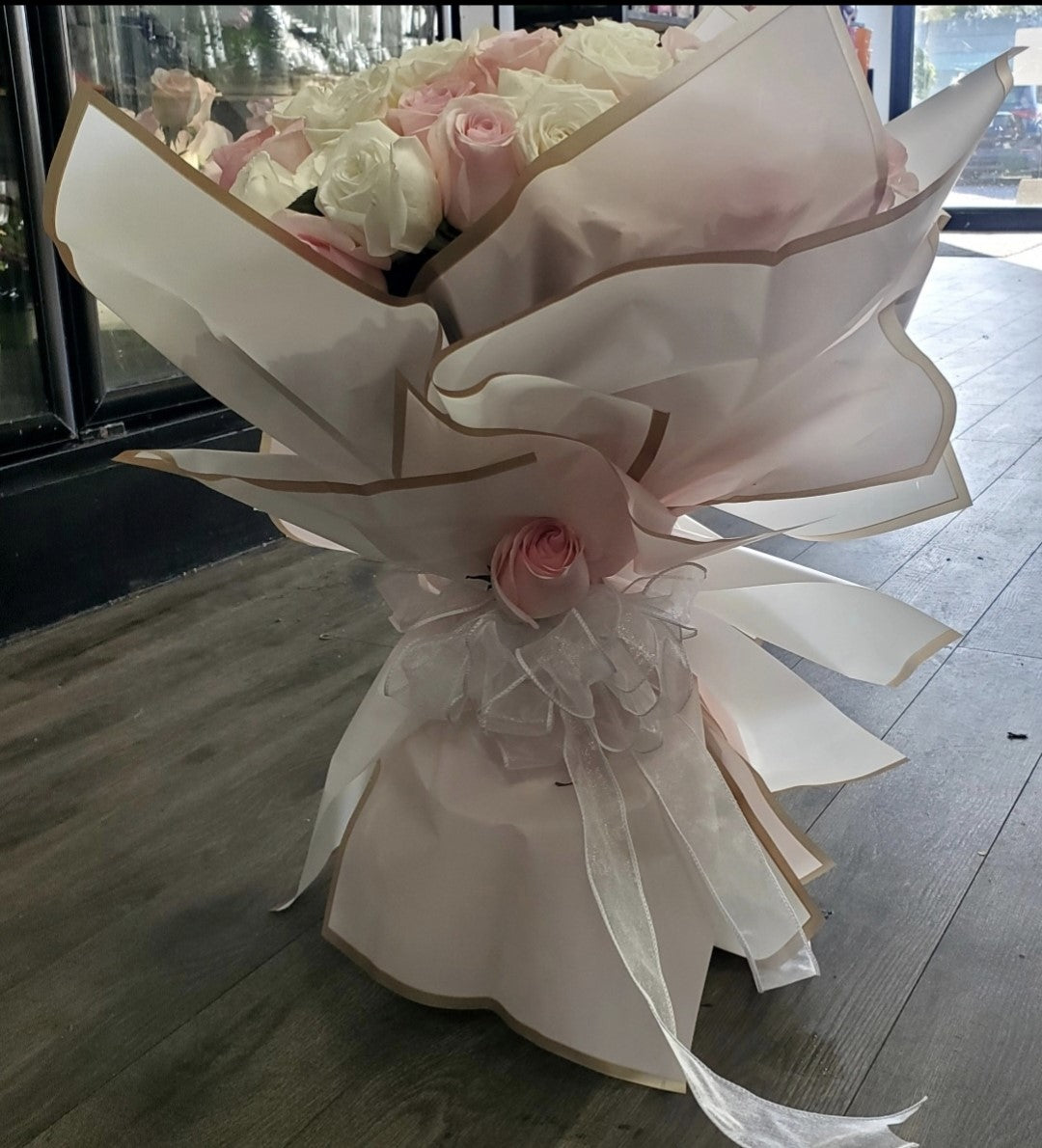 50 white and pink roses hand-tied bouquet